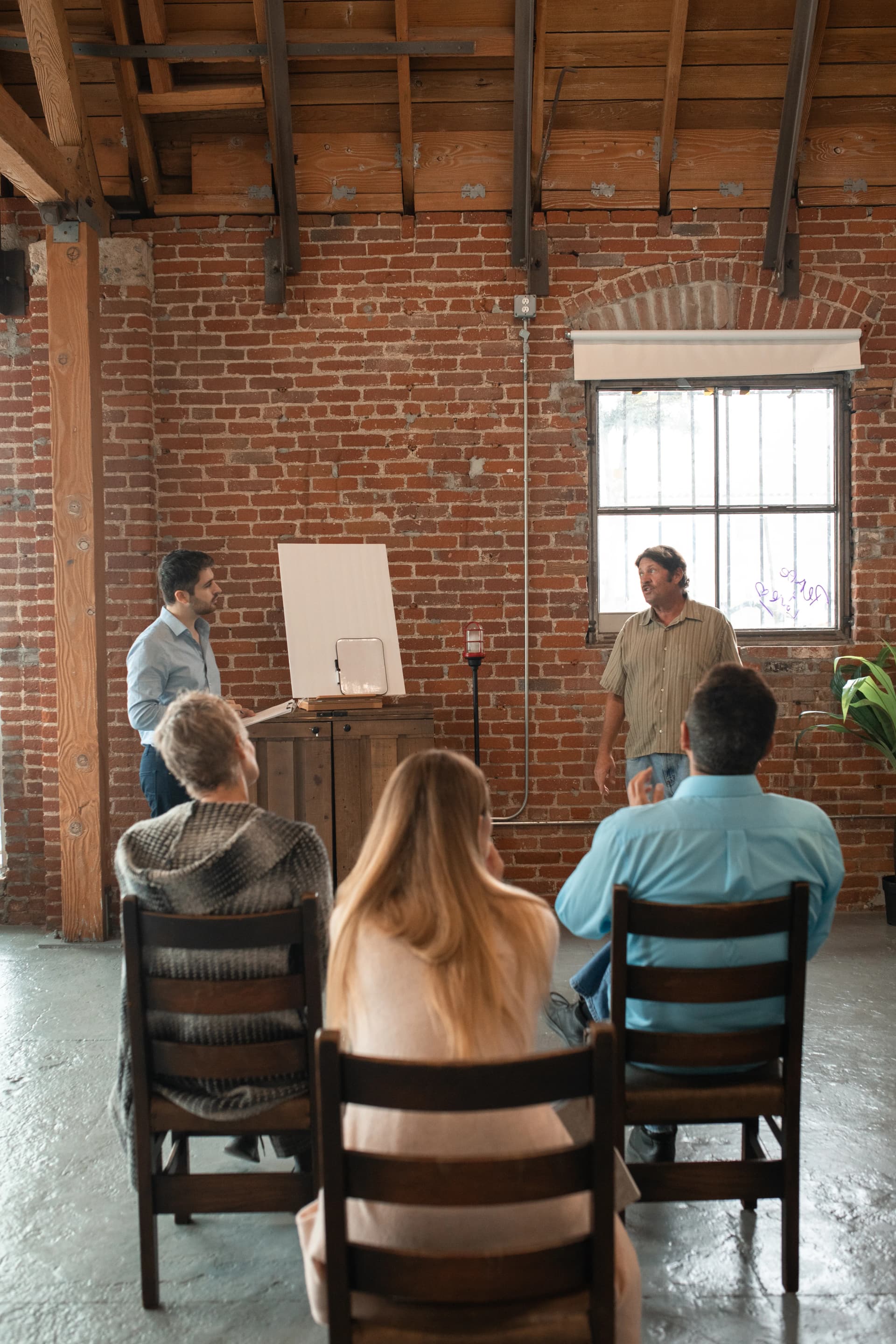 An instructor leading a discussion with adult learners